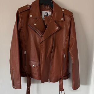 Moto jacket, leather by Kyzer Kraft. NWT, beautiful jacket. Nice embelli…
